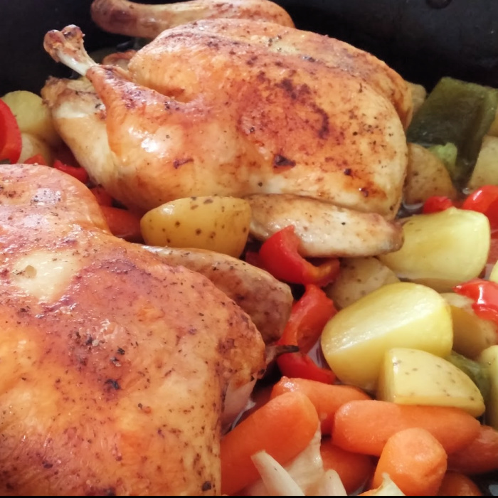 Roasting chicken with veggies