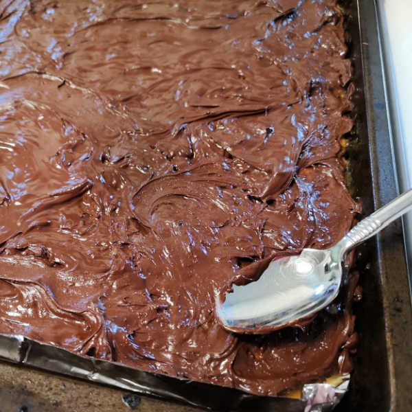 Prepping for making Skor Bar Cookies ... spread the chocolate chips once they melt. Prepping for making Skor Bar Cookies ... spread the chocolate chips once they melt.