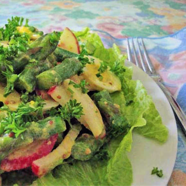 This springtime asparagus salad is so easy to make with hard-boiled eggs, radishes, and green onions.