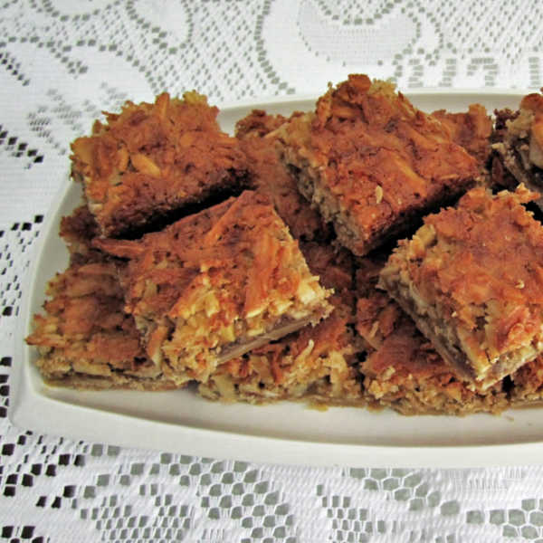 Oma's coconut bars are a hit! Try making this delicious German recipe that will truly impress