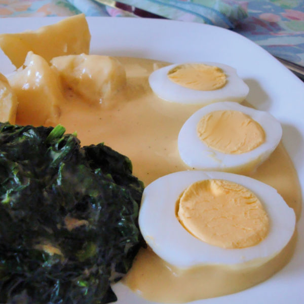 Creamed spinach and fried eggs