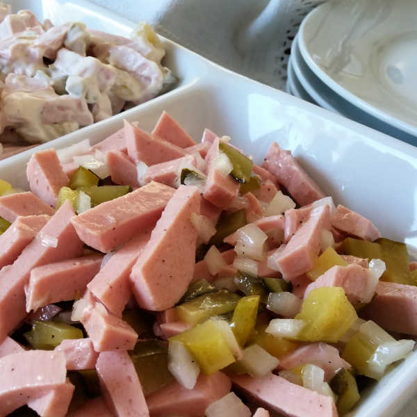 German Meat Salad comes in two types. One with mayo, Fleischsalat, shown at the back and one without, Wurstsalat, shown at the front. Both are so scrumptious and SO German!